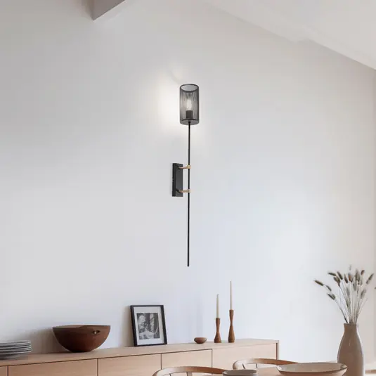 Pagamento Sicuro Applique Alek nero/ottone a forma di torcia